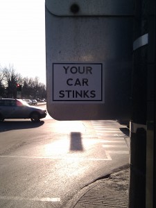 sticker attached to traffic sign